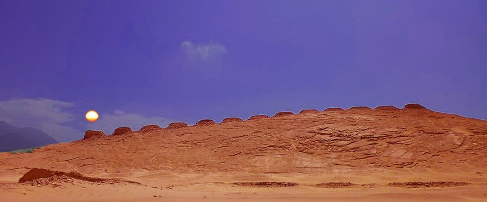 Thirteen stone towers of Chankillo along a desert ridge in Peru